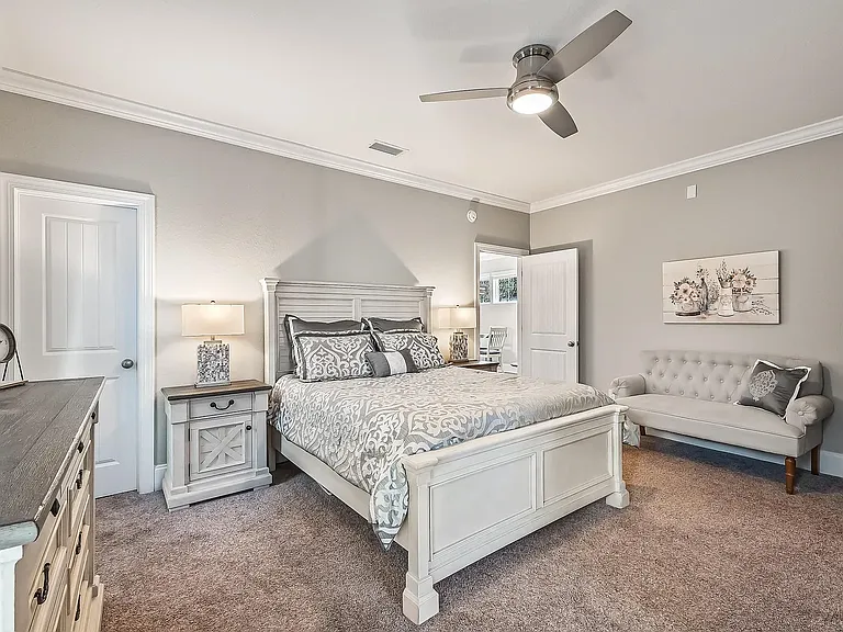 Master bedroom with two walk-in closet and a ensuite bathroom with walk-in shower