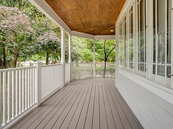 Wrap-around front porch with resessed lighting