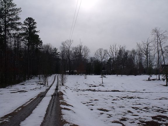 Welcome to 6031 Woodpecker Road - located on 6.24 Acres Lot