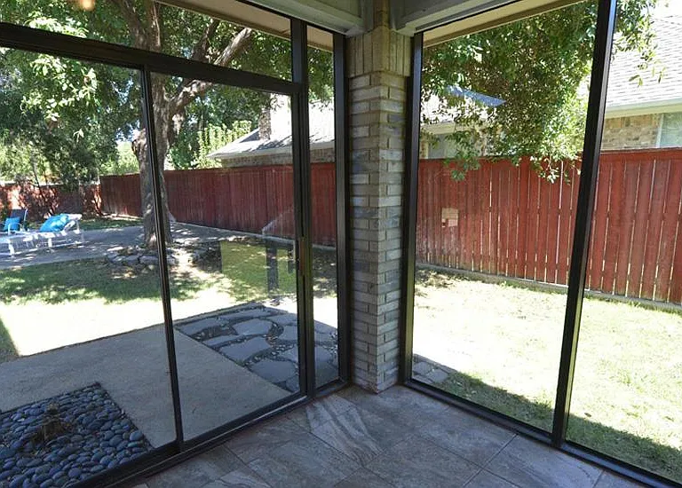 Exercise / Garden room with sliding door entry to pool / patio / backyard