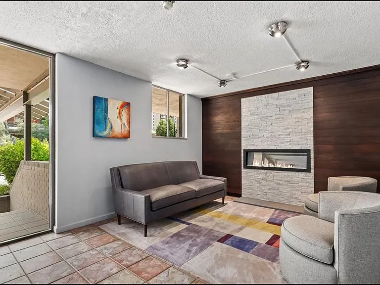 Entry with seating and modern decor.