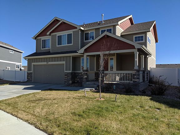 Beautiful house with fenced and landscaped yard.