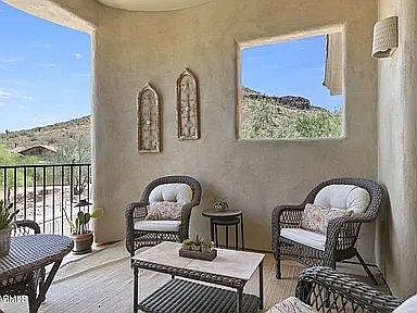 One of the 2 balconies, accessed from the primary bedroom and dining area.
