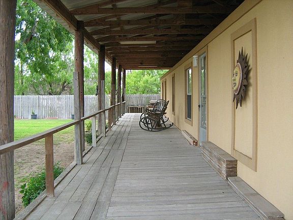 THIS COVERED PORCH GOES ON FOREVER