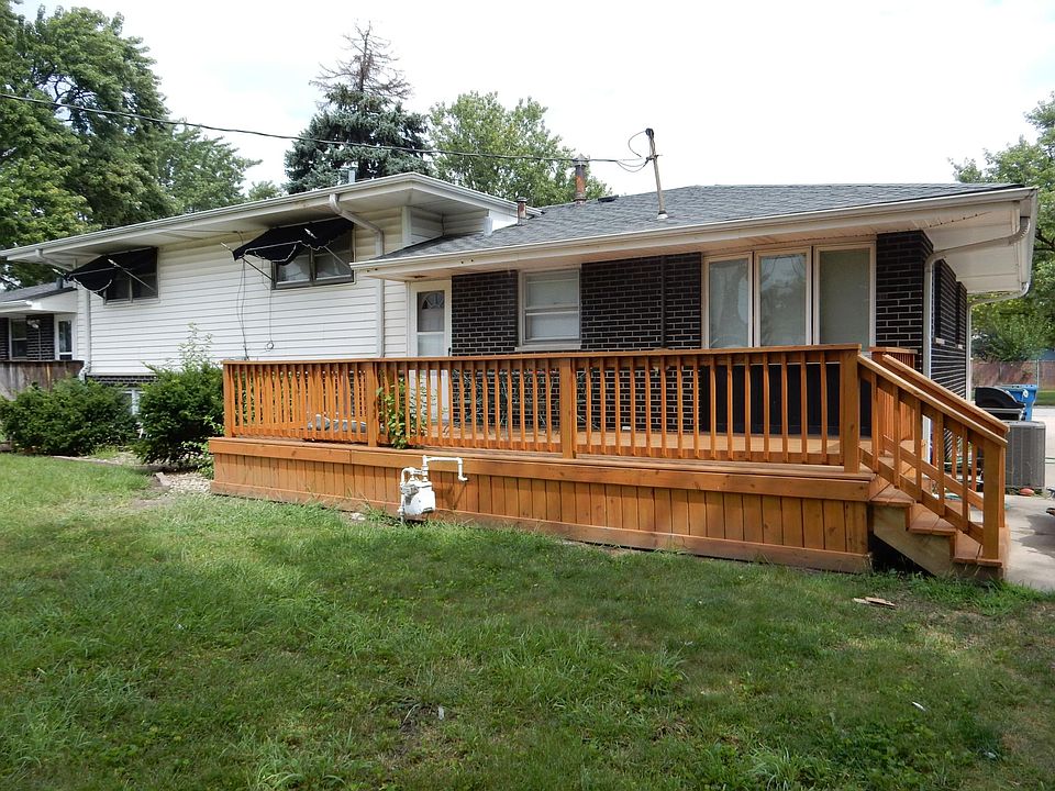 Back view of rental- new back deck- shared backyard