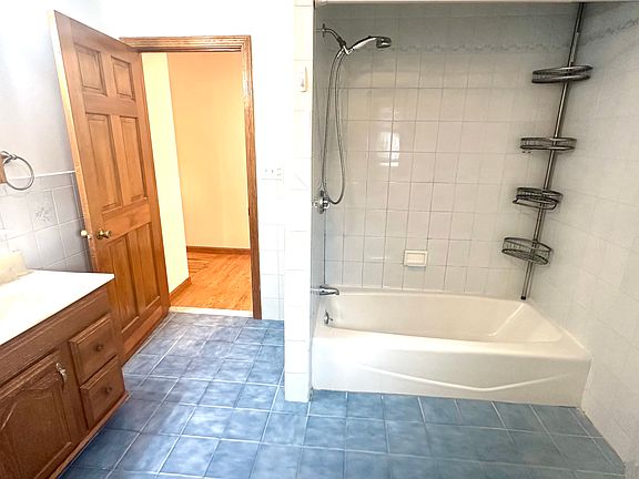 Large full bathroom/shower with new Italian tile