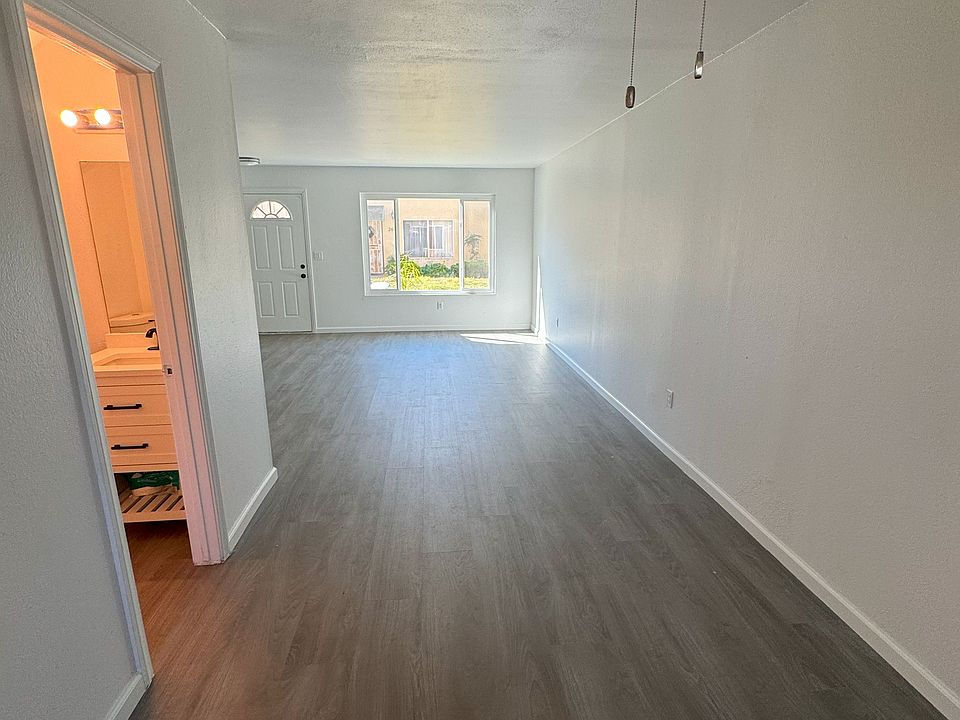 Dinning area looking towards living room and front door.