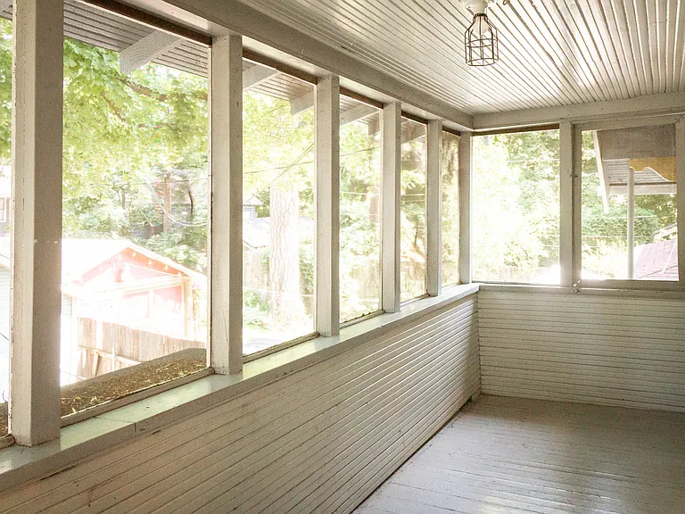 rear screened-in deck accessible from kitchen