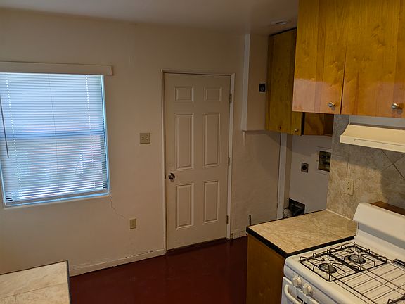 Laundry area, kitchen table area
