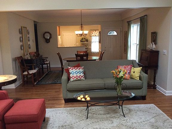 Living room
						:
						sun porch looking into Living, dining & kitchen. Hardwood floors thru 1st floor