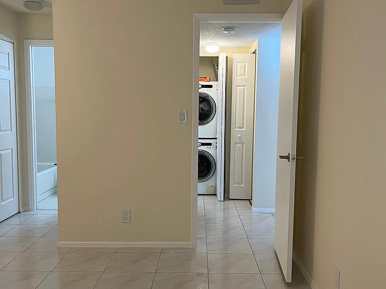 Bedroom has two entrances, sliding door adds privacy to the bedroom. Two clothing closets.