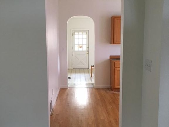 Walk view through the dinning room to kitchen