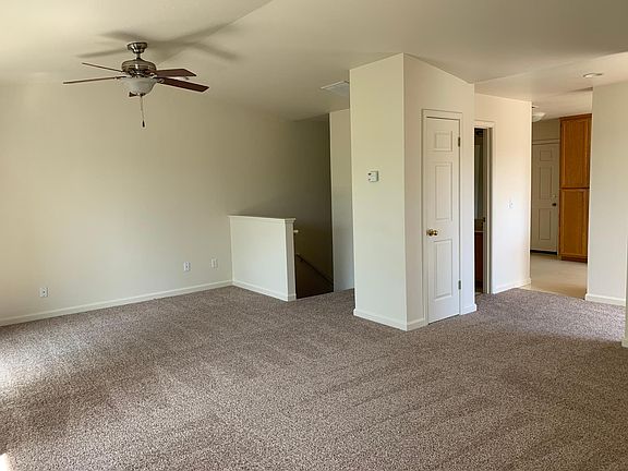 Living room, stairs down to bedrooms.