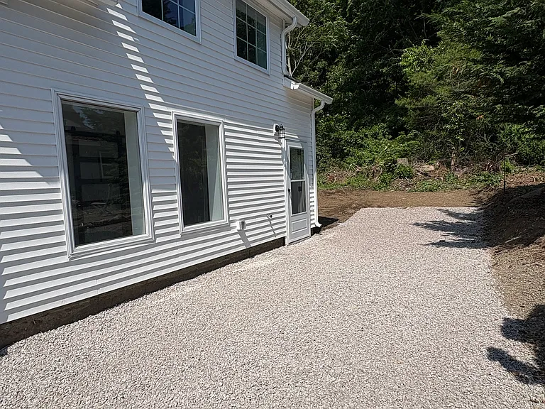 Side entry with dedicated off-street parking and private backyard area