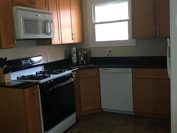 Updated Kitchen with lots of custom cabinets for storage