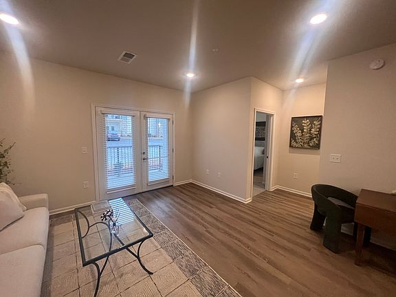 The living room area with access to your personal patio