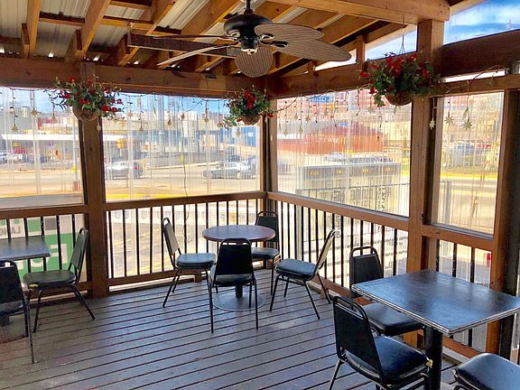 Outdoor Screened in Deck view of parking lot Bloomfield Brid