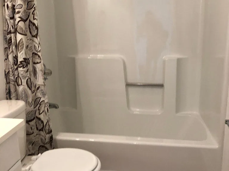 Bathroom with refinished bathtub unit