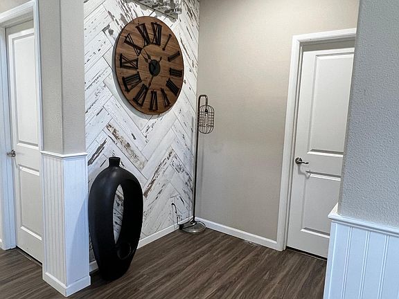 Door leading to bedroom on the main floor and full bathroom.