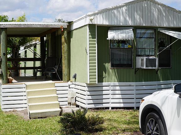 Main Entrance With Lighted Porch