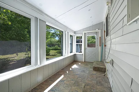 sunroom showing door to backyard