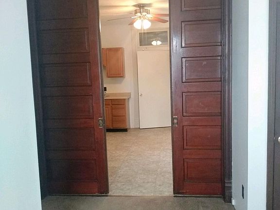 POCKET HARDWOOD DOORS TO SEPARATE ROOMS