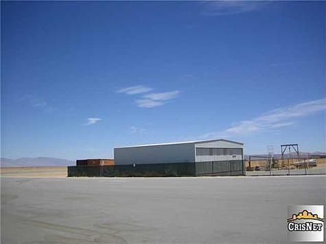 ADDITIONAL 44'X51' AIRCRAFT HANGER LOCATED AT CAR CORNER OF PROPERTY FOR PLANES, STORAGE, OR RENTAL 