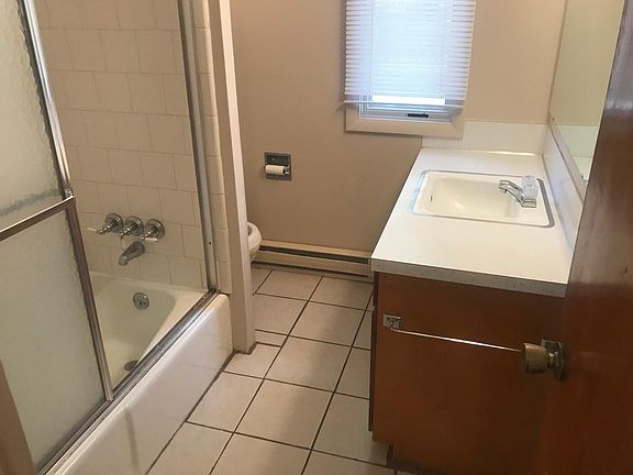 Bathroom with ceramic tile floor