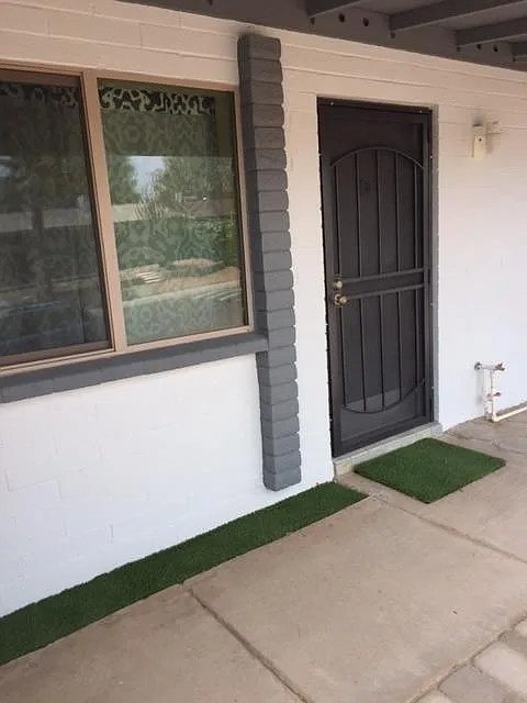 Front entry with steel security door - 17430 N 8th Ave