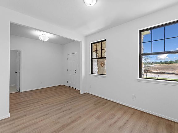 Versatile flex space with endless possibilities! This spacious area is perfect for an office, a home