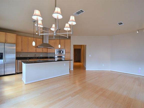 Desirable floor plan with island cooking area.  Refrigerator included
