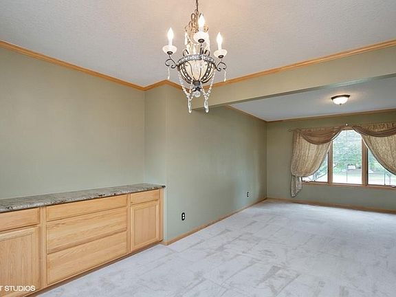 5th image of 208 NW Driftwood Ct