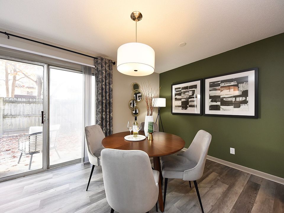 Experience the warmth of this inviting dining space, perfect for intimate gatherings.