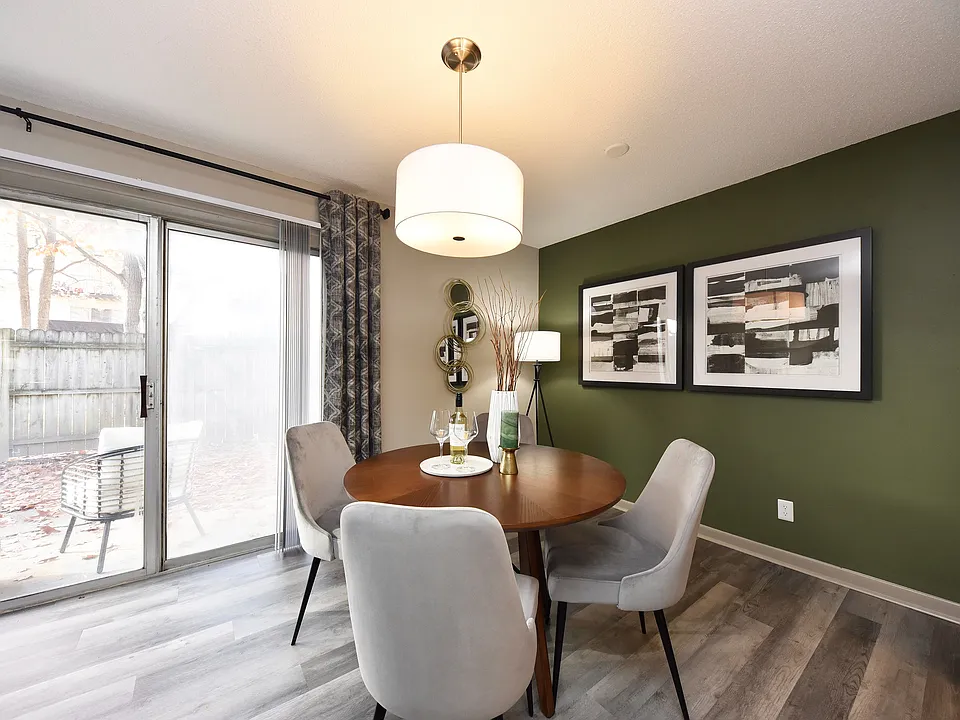 Experience the warmth of this inviting dining space, perfect for intimate gatherings.