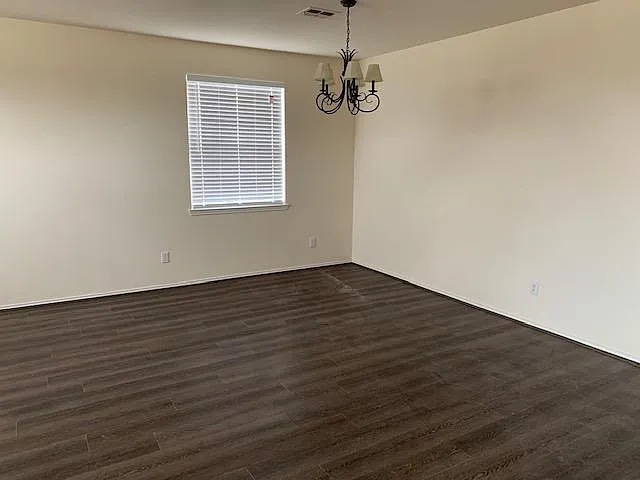 Luxury vinyl plank in 2nd living area that can also be used as dining area.