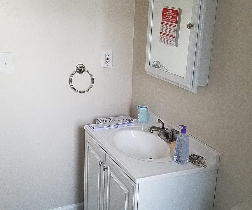 Even new bath vanity, lights and floor.