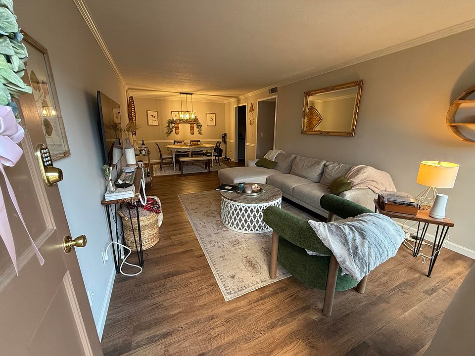 Open-concept living to dining room. (Unit does not come furnished)