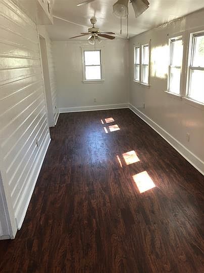 Large living room with lots of natural light