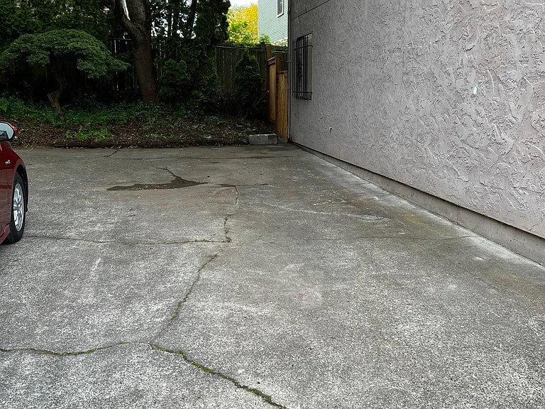 Uncovered two assigned parking space