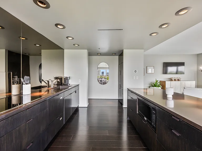 Generous prep space and integrated appliances make entertaining easy.