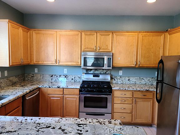 Granite counter top with stainless steel appliances
