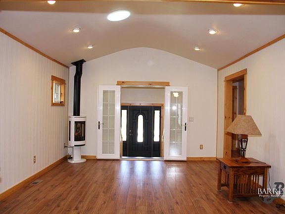 Spacious and airy living area. Cozy gas stove for heat and a