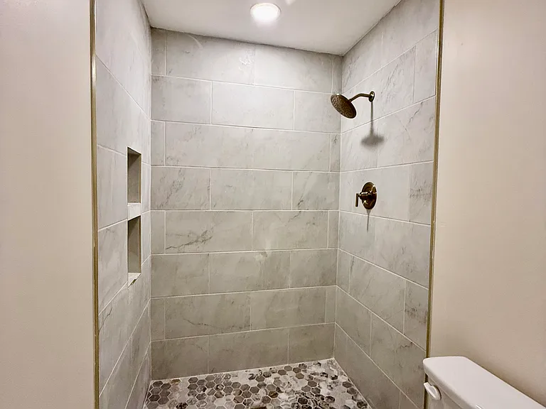 New custom shower in bathroom off of bedroom #1