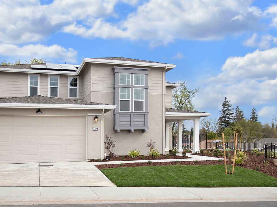 Plan 2 Exterior. Photography is representational of home offered and not meant to be exact.