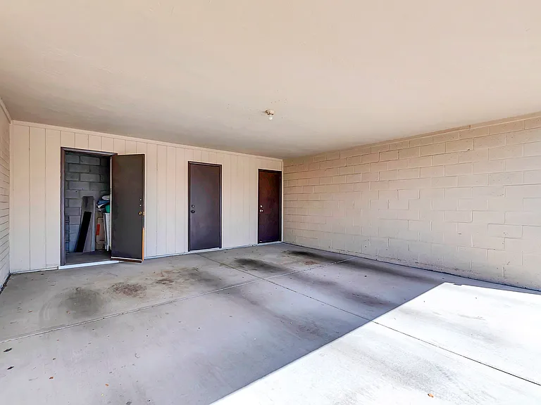 Covered Carport with storage closet