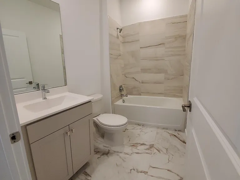 1949 NE Ocean Dunes Dr — Photo 6