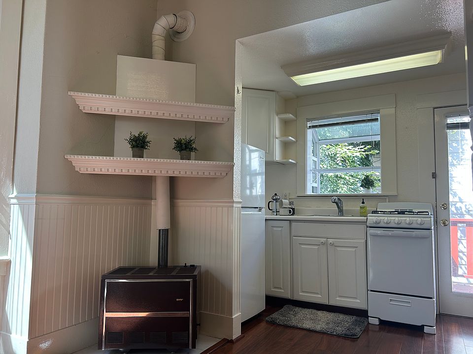 Beautiful wainscoting and custom wood work throughout the unit adds charm and appeal