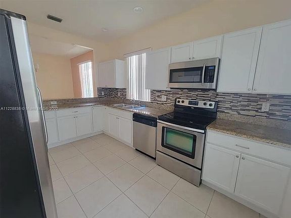 3rd image of 10860 Fillmore Dr #10860