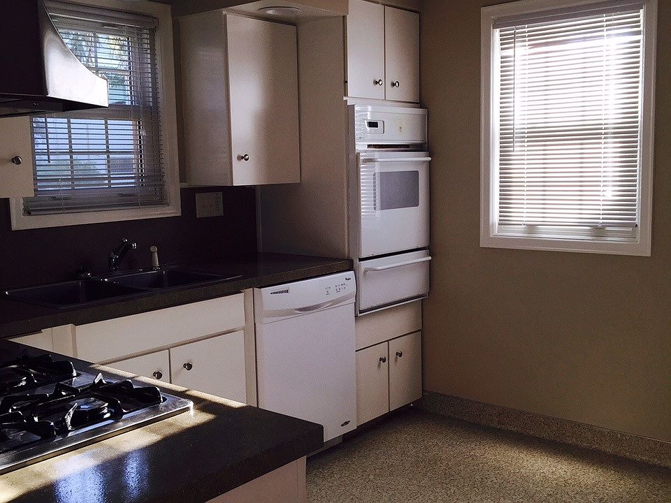 Kitchen with wall oven and counter top stove