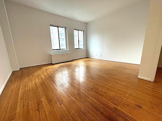 1st image of 121 E 12th St APT 7D